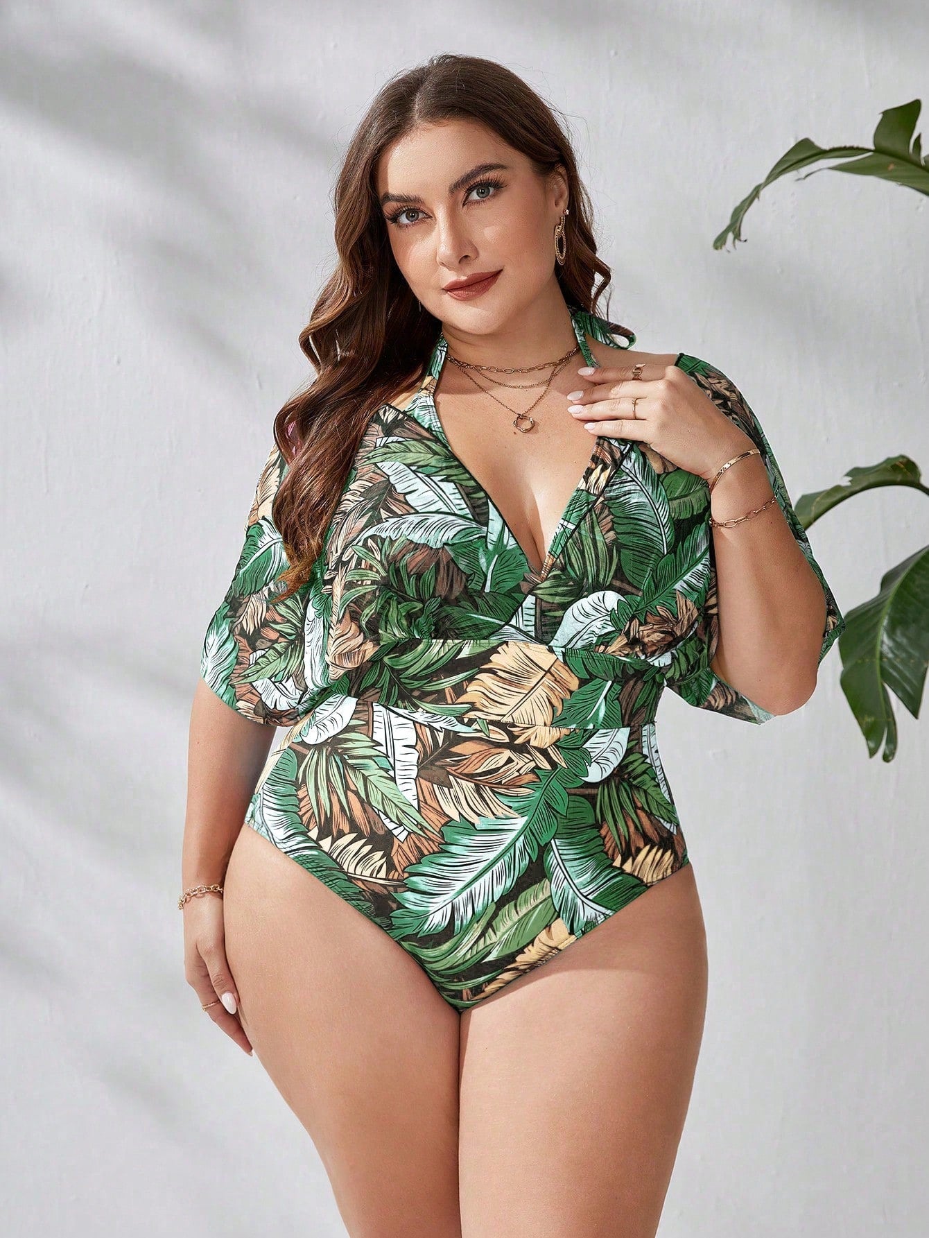 Maiô feminino com mangas transparentes caídas