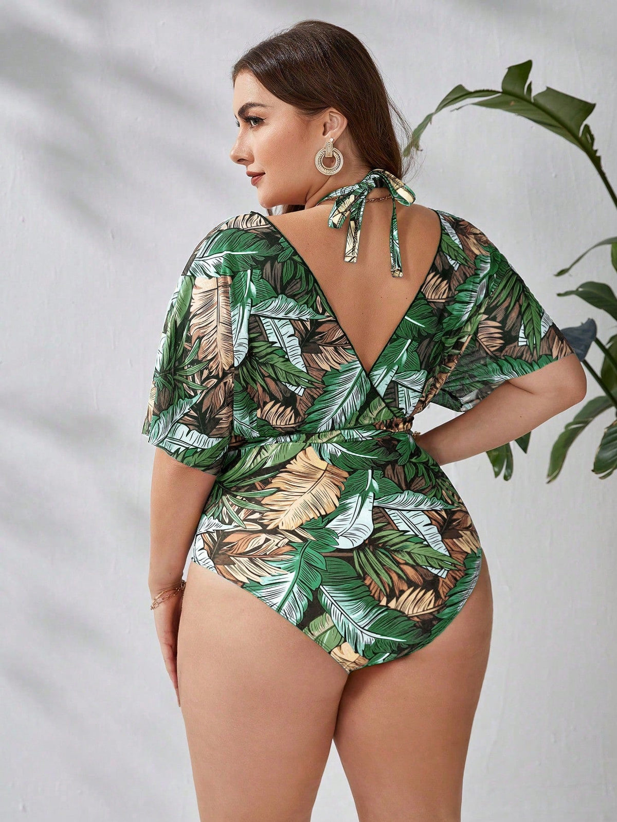 Maiô feminino com mangas transparentes caídas