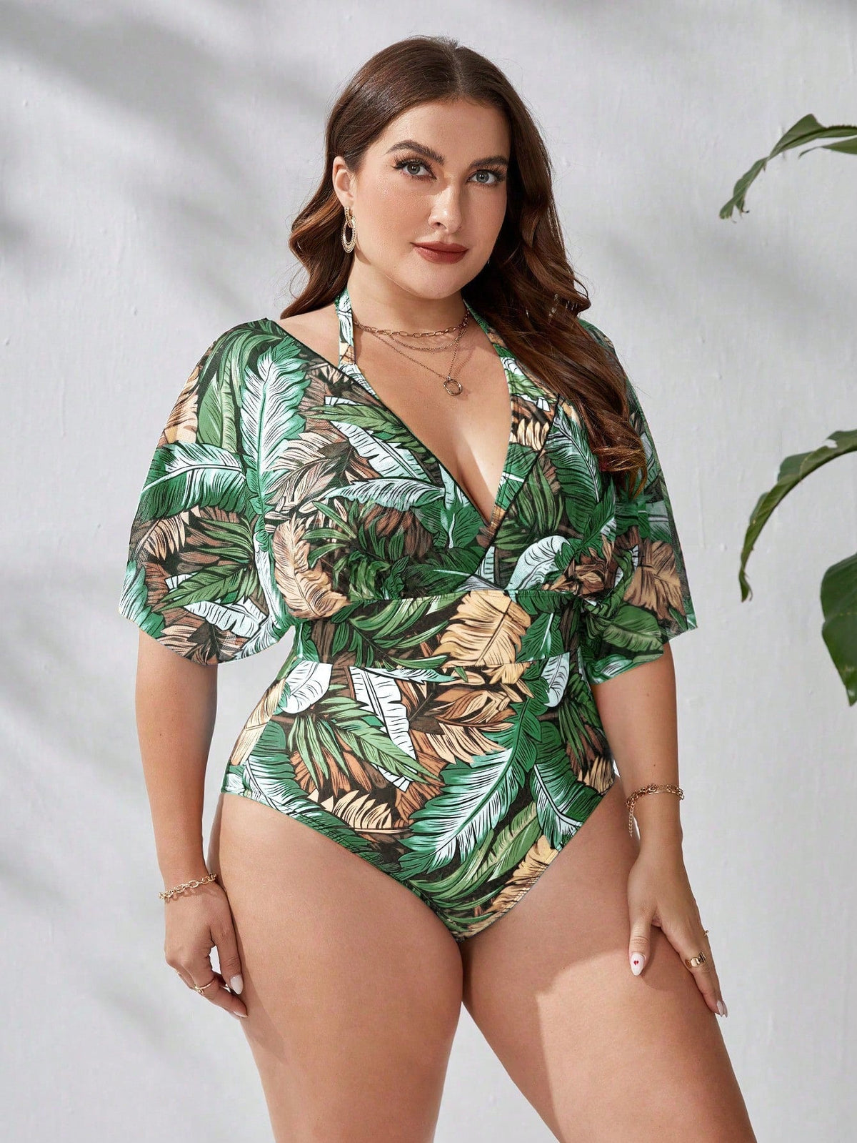 Maiô feminino com mangas transparentes caídas